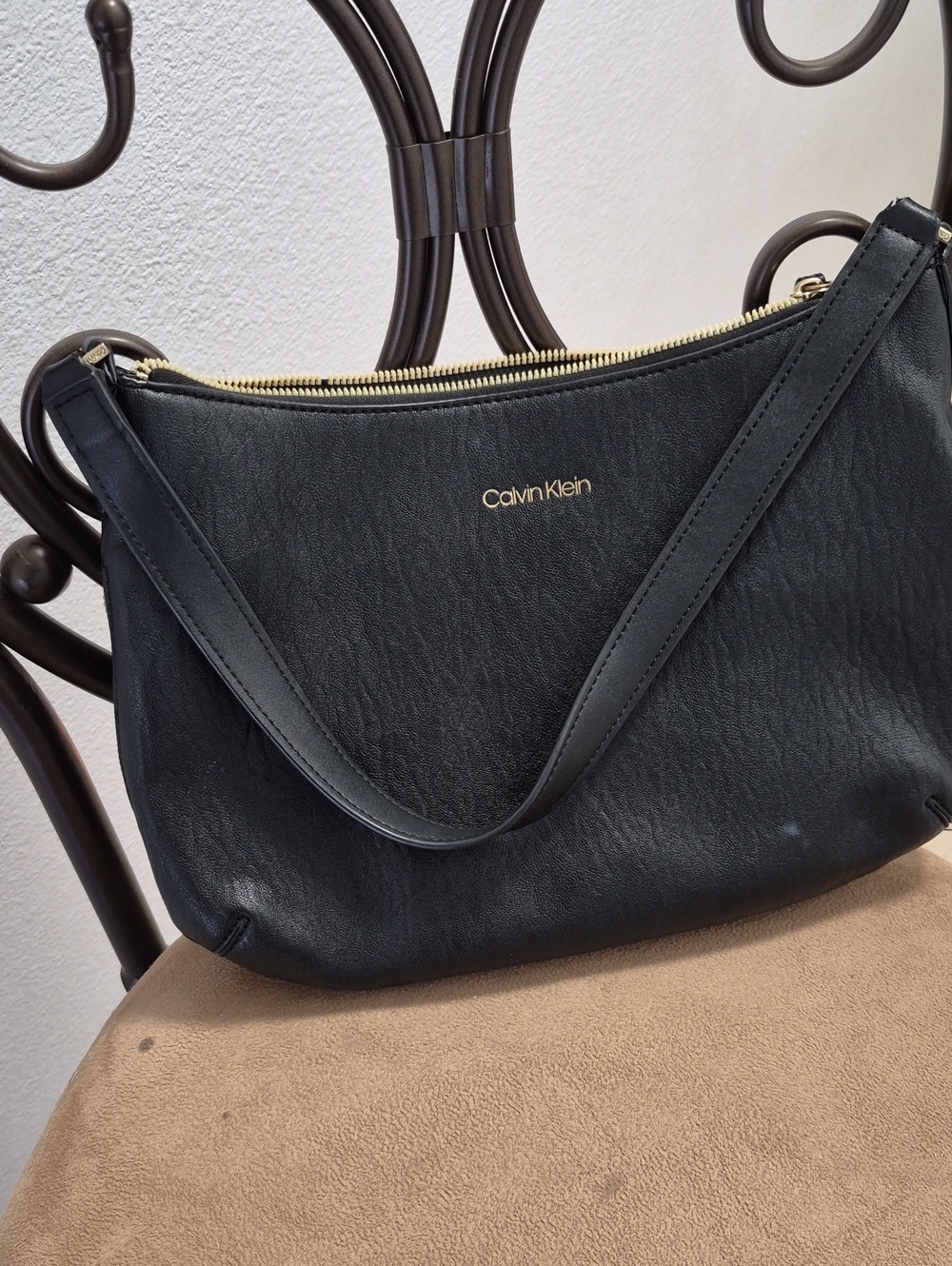 Calvin Klein Black Shoulder Bag with Gold Logo. Zipper underneath for more room
